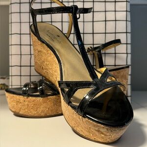 Kate Spade patented leather black wedge sandals.